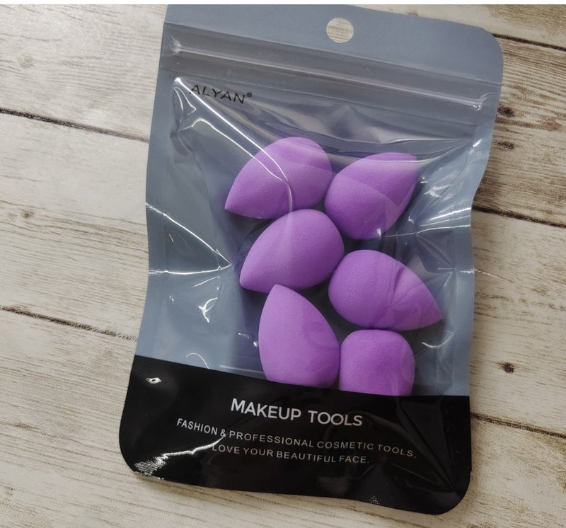 Sold in packs of 6: Mini beauty blender, super soft cotton pads that don't absorb much product, eyeshadow blender, lip makeup puff.